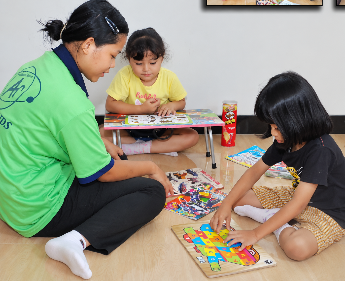 Domestic helper caring for a child, placed through AMR Maids Singapore